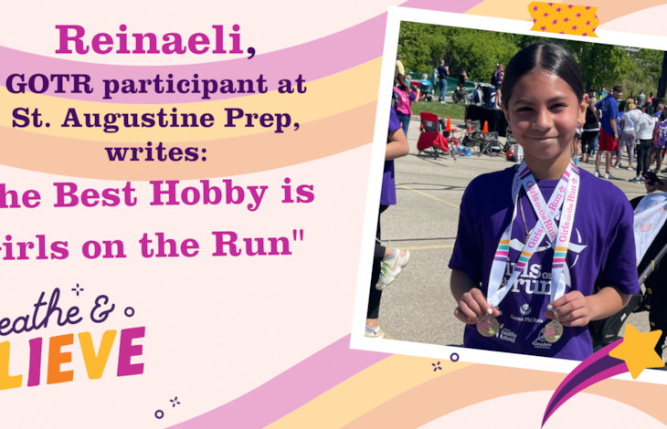 Reinaeli, GOTR participant, holds up her 5K medal with a smile.